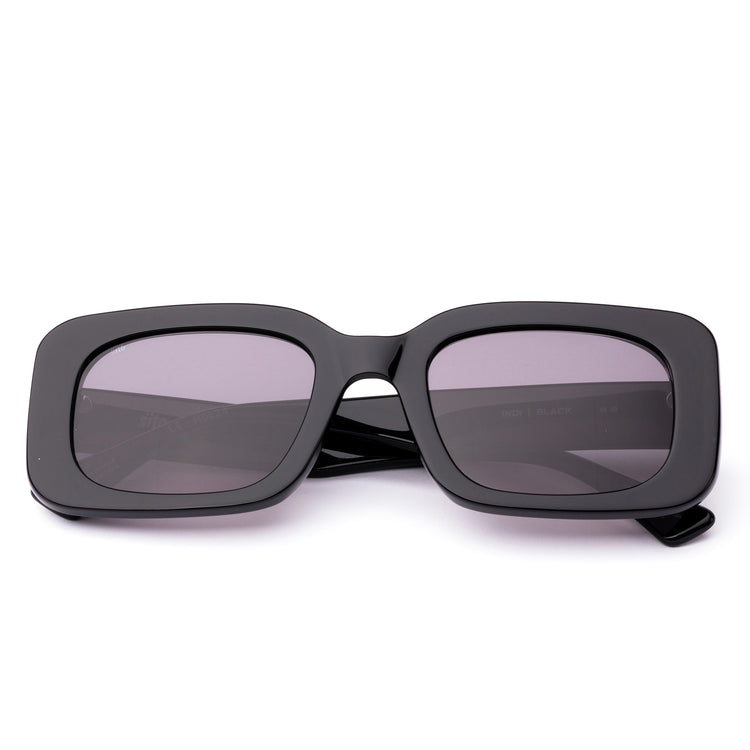 Black square womens sunglasses with grey lenses on a white background