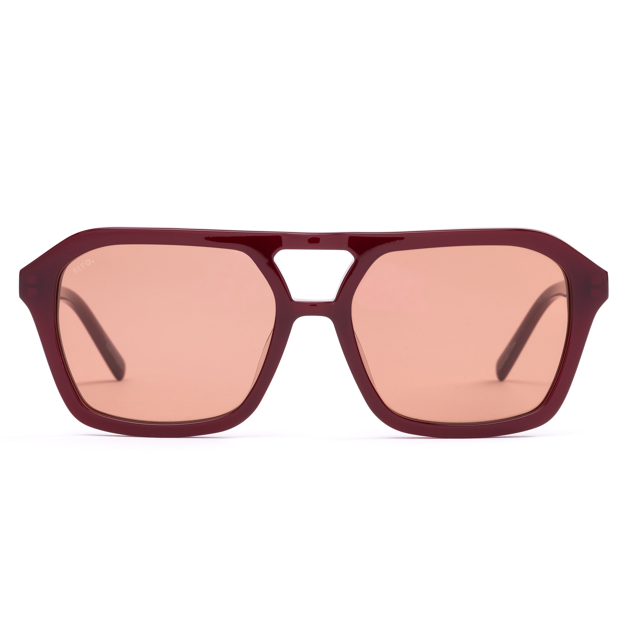 Dark red aviator sunglasses on white background.